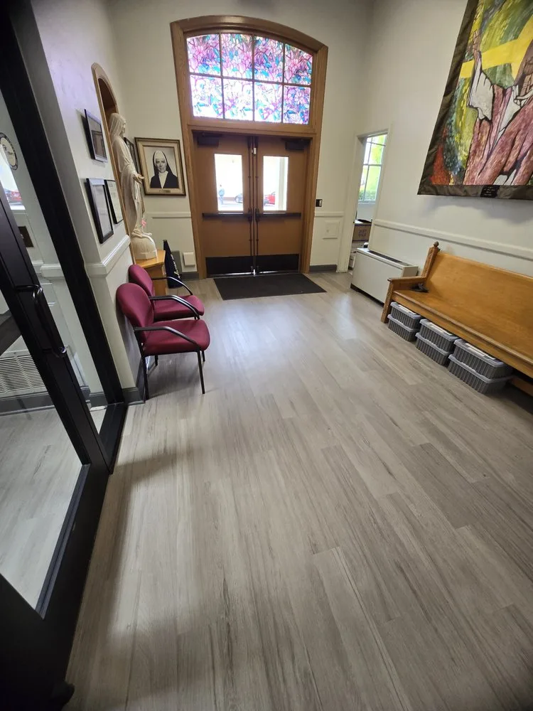 Luxury vinyl plank flooring installation in a church lobby by The Flooring Design Center, Campbell, CA